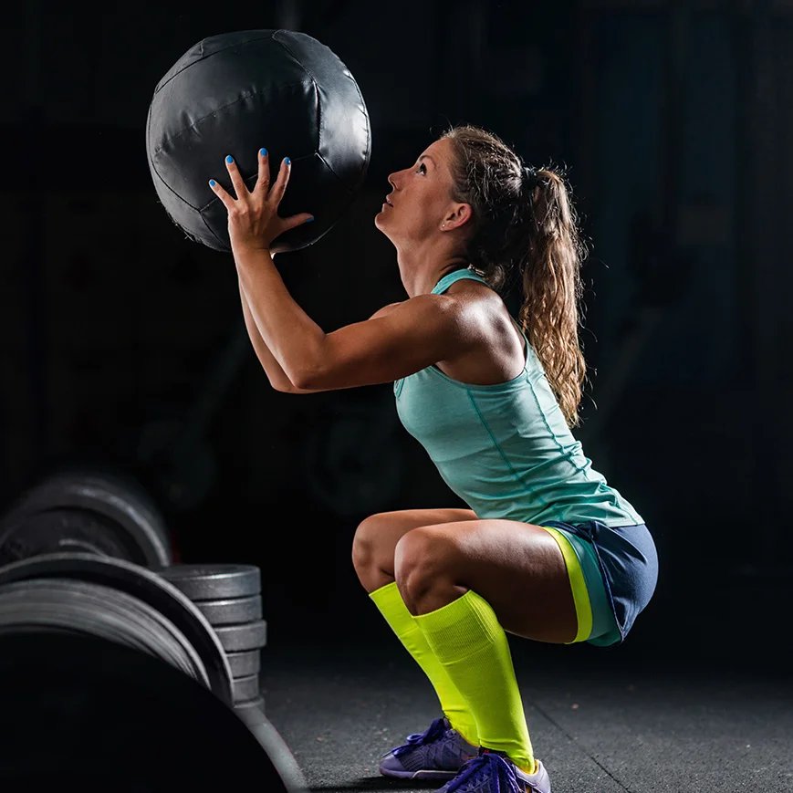 woman-doing-exercise-on-a-machine-in-a-gym